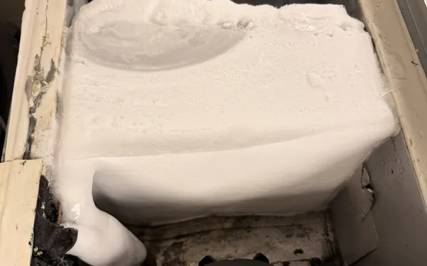 Commercial refrigeration evaporator coil completely covered in ice
